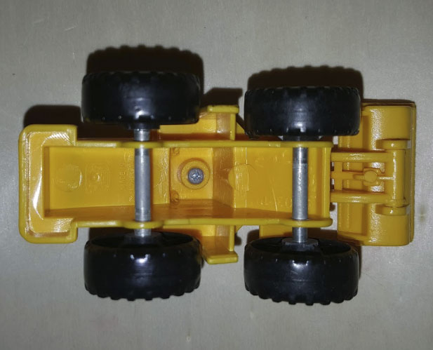 Bottom of a plastic toy digger